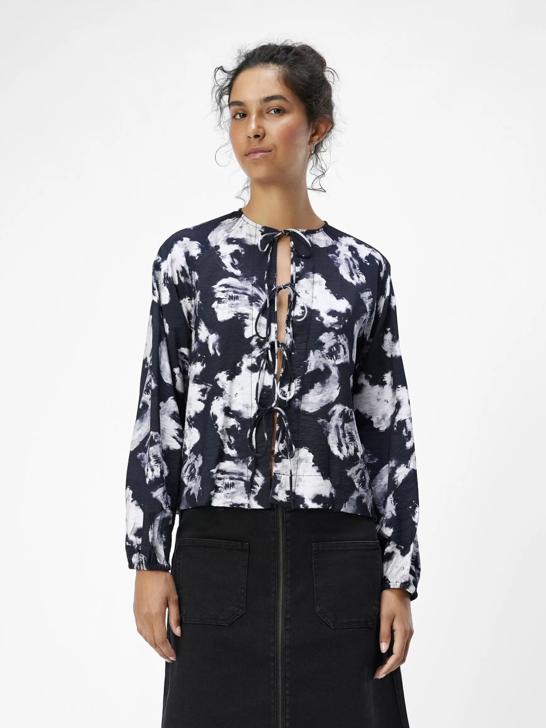Dame OBJECT BINDELUKNING FORAN TOP